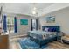 Bedroom with tray ceilings, natural light, and blue accents for a serene atmosphere at 225 Hanahan Plantation Cir, Hanahan, SC 29410