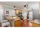 Eat-in kitchen features stainless appliances, granite counters, tile backsplash and hardwood floors at 225 Hanahan Plantation Cir, Hanahan, SC 29410