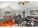 Open concept living and dining room with vaulted ceilings, hardwood floors, and modern decor at 225 Hanahan Plantation Cir, Hanahan, SC 29410