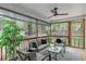 Relaxing screened porch with outdoor seating and a view of the backyard at 225 Hanahan Plantation Cir, Hanahan, SC 29410