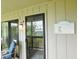 Charming entryway with 'Our Beach House' decor and a view of the scenic surroundings at 229 Linkside Villas # 1/3 Share, Edisto Beach, SC 29438
