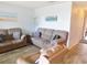 Comfortable living room featuring plush sofas, modern decor, and ample space for relaxation at 229 Linkside Villas # 1/3 Share, Edisto Beach, SC 29438