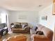 Comfortable living room featuring plush sofas, beach-themed decor, and ample natural light at 229 Linkside Villas # 1/3 Share, Edisto Beach, SC 29438