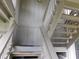 An interior view of a grey painted staircase in the home at 229 Linkside Villas # 1/3 Share, Edisto Beach, SC 29438