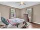 Cozy bedroom with ceiling fan, hardwood floors, and natural lighting at 234 Two Hitch Rd, Goose Creek, SC 29445