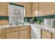 Well-lit kitchen featuring essential appliances and ample cabinet space for storage at 234 Two Hitch Rd, Goose Creek, SC 29445