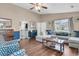 Bright living room featuring a fireplace, hardwood floors, and open floor plan at 234 Two Hitch Rd, Goose Creek, SC 29445