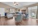 Spacious living room with fireplace, comfortable seating, and sliding glass door to outdoors at 234 Two Hitch Rd, Goose Creek, SC 29445