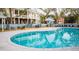 Inviting community pool with sun deck, lounge chairs and clubhouse offering a resort-style experience at 2383 Lenwick Hall Ln, Johns Island, SC 29455