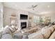 Open concept living room with fireplace and view of the dining area at 2383 Lenwick Hall Ln, Johns Island, SC 29455
