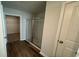 Bathroom features a glass shower door, and has easy access to a linen closet at 262 Wild Strawberry Ln, Moncks Corner, SC 29461