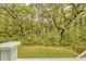Backyard wooded views from elevated porch at 2856 Claybrook St, Johns Island, SC 29455