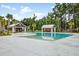 Community pool with lounge areas, cabanas, and lush landscaping for residents to enjoy at 2856 Claybrook St, Johns Island, SC 29455