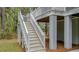 Exterior view of the home featuring stairs leading to the deck at 2856 Claybrook St, Johns Island, SC 29455