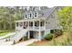 Inviting two-story home with front porch, classic railings, and traditional design at 2856 Claybrook St, Johns Island, SC 29455
