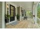 Inviting front porch with outdoor seating and charming decor at 2856 Claybrook St, Johns Island, SC 29455