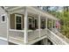 Beautiful front porch with white railings and charming details at 2856 Claybrook St, Johns Island, SC 29455