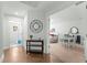 Hallway leading to a dining and living area featuring hardwood floors and recessed lighting at 2856 Claybrook St, Johns Island, SC 29455
