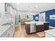 Open-concept kitchen and living area with stainless steel appliances and a large island at 2856 Claybrook St, Johns Island, SC 29455