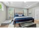 Inviting main bedroom with tray ceiling and windows, creating a bright and serene atmosphere at 2856 Claybrook St, Johns Island, SC 29455