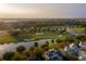 Breathtaking golf course view with lake, lush fairways, and idyllic community setting at 301 Hidden Bottom Ln, Daniel Island, SC 29492