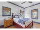 Bedroom with natural lighting and beautiful wood flooring and blue trim at 301 Hidden Bottom Ln, Daniel Island, SC 29492