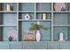 Custom built-in shelving unit offers stylish display and storage at 301 Hidden Bottom Ln, Daniel Island, SC 29492