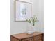 Stylish decor atop a wooden cabinet adding charm to the room's ambiance at 301 Hidden Bottom Ln, Daniel Island, SC 29492