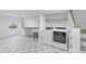 Functional laundry room featuring patterned tile flooring, a utility sink, and a new washer and dryer at 301 Hidden Bottom Ln, Daniel Island, SC 29492