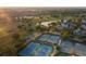 Enjoy tennis on well maintained courts surrounded by lush landscape near the golf course at 301 Hidden Bottom Ln, Daniel Island, SC 29492