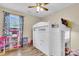 bedroom features a unique lofted bed with built-in storage space and wood look flooring at 311 Old Stone Ct, Moncks Corner, SC 29461