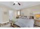 Comfortable bedroom with a ceiling fan, natural light, and decorative wall art at 311 Old Stone Ct, Moncks Corner, SC 29461