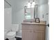 Cozy bathroom with vanity, sink, and a well-lit mirror at 341 W Coleman Blvd # F, Mount Pleasant, SC 29464