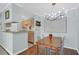 View of dining area and eat-in kitchen with light blue walls at 341 W Coleman Blvd # F, Mount Pleasant, SC 29464