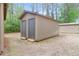 Exterior shed with a grey double door, offering ample storage at 341 W Coleman Blvd # F, Mount Pleasant, SC 29464