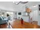 Inviting living area featuring an open layout, hardwood floors, and a view of the modern kitchen at 341 W Coleman Blvd # F, Mount Pleasant, SC 29464