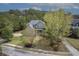 Aerial view showing the home surrounded by trees, highlighting neighborhood and curb appeal at 3805 Adrian Way, Mount Pleasant, SC 29466
