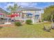 Expansive backyard featuring a pool, well-manicured lawn, and a spacious deck perfect for outdoor entertaining at 3805 Adrian Way, Mount Pleasant, SC 29466