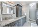 Bathroom features double sinks, granite countertops and custom cabinets for storage at 3805 Adrian Way, Mount Pleasant, SC 29466
