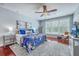 Comfortable bedroom with a ceiling fan and hardwood floors at 3805 Adrian Way, Mount Pleasant, SC 29466