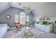 Bright bedroom with a unique light fixture, a cozy daybed, and plenty of seating at 3805 Adrian Way, Mount Pleasant, SC 29466
