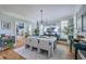 Elegant dining room with a spacious table, stylish decor, and hardwood floors at 3805 Adrian Way, Mount Pleasant, SC 29466