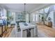 Bright dining room with a large table, natural light, and access to other rooms at 3805 Adrian Way, Mount Pleasant, SC 29466