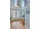 Grand foyer with hardwood floors, a staircase, chandelier, and lots of natural light at 3805 Adrian Way, Mount Pleasant, SC 29466