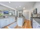 Modern kitchen with stainless appliances, kitchen island, hardwood floors, granite countertops, and an open layout at 3805 Adrian Way, Mount Pleasant, SC 29466