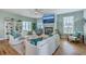 Cozy living room featuring a fireplace, comfortable seating, and ample natural light at 3805 Adrian Way, Mount Pleasant, SC 29466