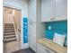 Charming mud room with custom cabinets and a cozy bench at 3805 Adrian Way, Mount Pleasant, SC 29466