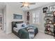 Spacious bedroom with a bed, ceiling fan, sports memorabilia, and a window with blinds at 3873 Newhall St, Mount Pleasant, SC 29466