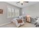 Bedroom featuring lots of natural light, plantation shutters, and small keyboard for music making at 3873 Newhall St, Mount Pleasant, SC 29466