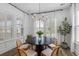 Charming dining room with a round table, comfortable chairs, and bright natural lighting at 3873 Newhall St, Mount Pleasant, SC 29466